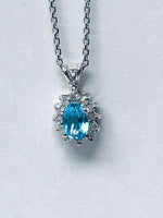 Oval Blue Topaz Necklace in 14k White Gold